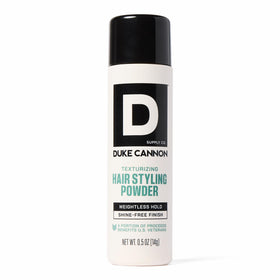 Duke Cannon front packaging showing product name and compact size, lightweight grooming benefit