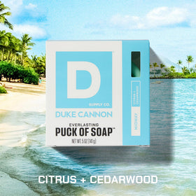 Duke Cannon puck foaming in hand showing creamy lather for effective cleansing
