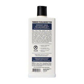 Duke Cannon Naval Diplomacy bottle close-up highlighting premium texture