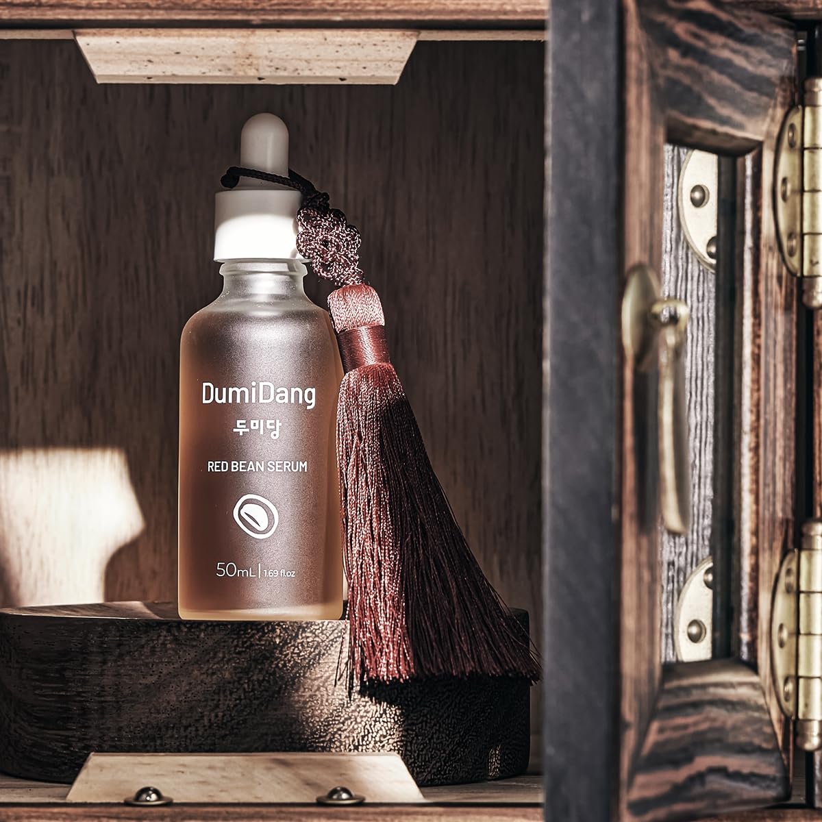 DumiDang serum texture on skin close-up, shows quick absorption and smooth finish