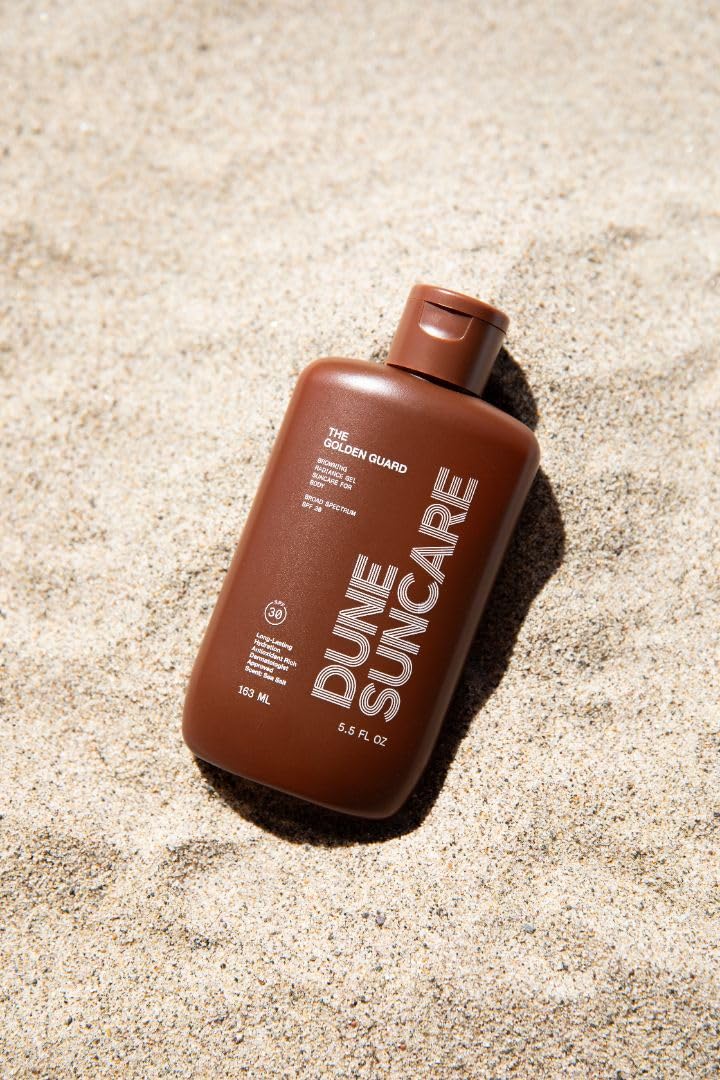 DUNE Golden Guard in a beach bag being used outdoors showing reef-safe benefit
