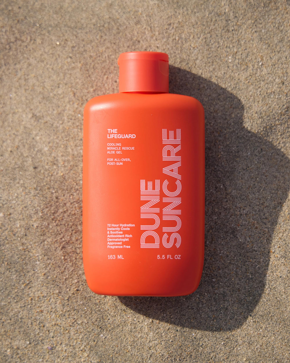 DUNE Lifeguard in beach setting conveying post-sun recovery comfort