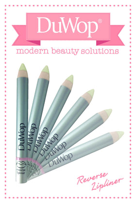 DuWop Reverse Lipliner next to lipstick showing compact size and travel benefit