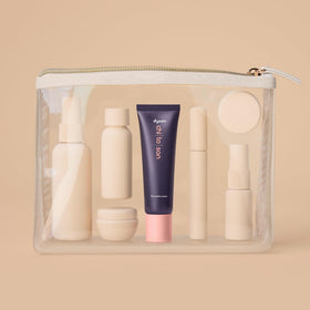 Dyson Chitosan ingredient label closeup highlighting chitosan and oil blend for frizz control