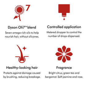 Applying Dyson Omega to mid-lengths and ends to reduce frizz and add shine