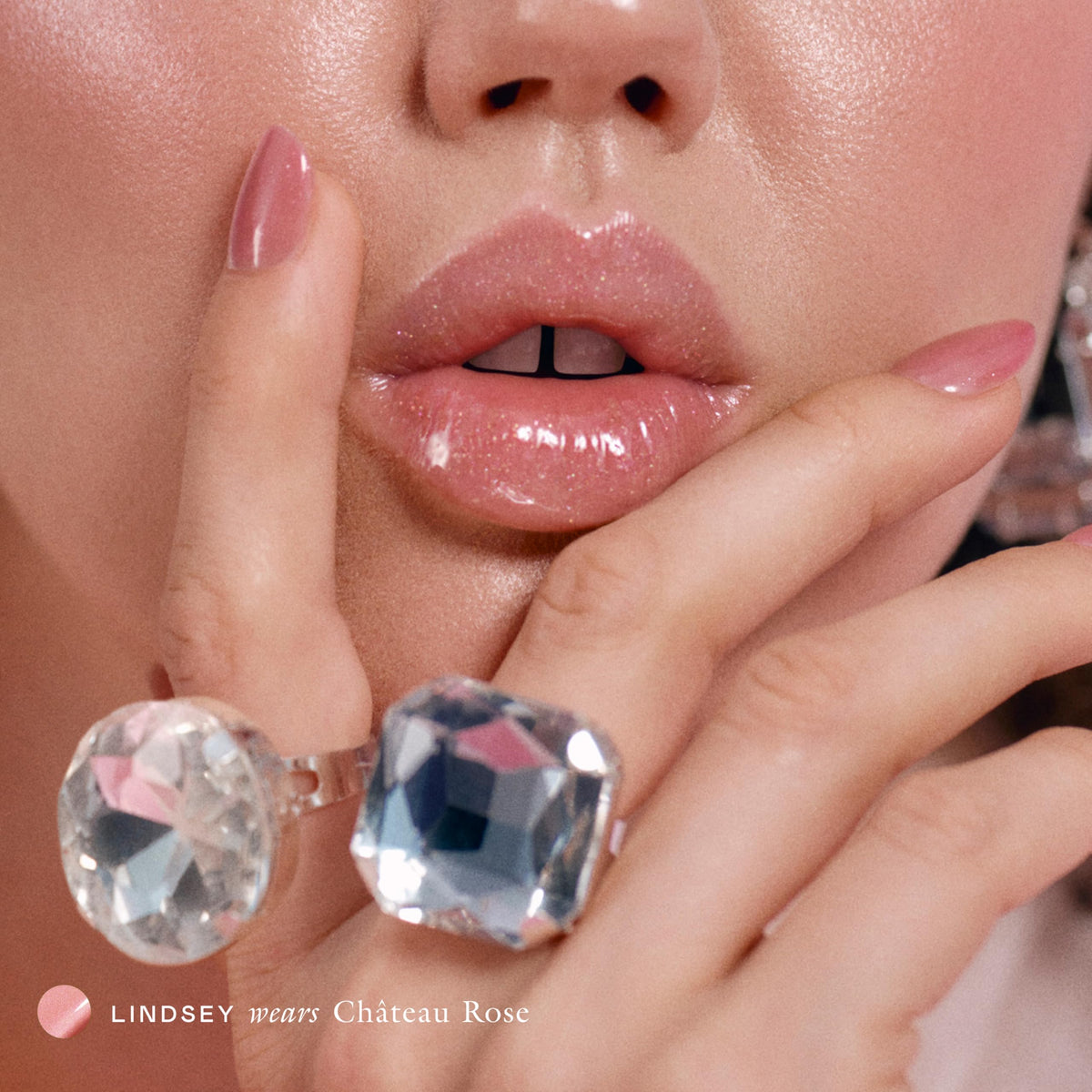 EADEM balm applied on lips in a lifestyle shot showing natural glossy benefit