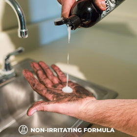 Eagle Grit in-use image of mechanic washing hands removes grease fast