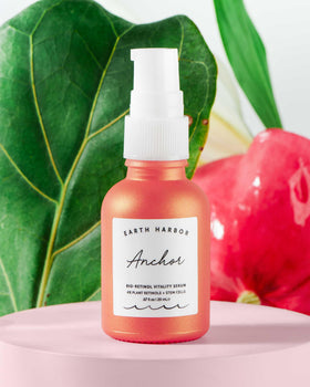 Earth Harbor ANCHOR serum applied to hand demonstrating lightweight spreadability