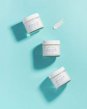 Earth Harbor opened jar revealing dewy cream for intense overnight moisture