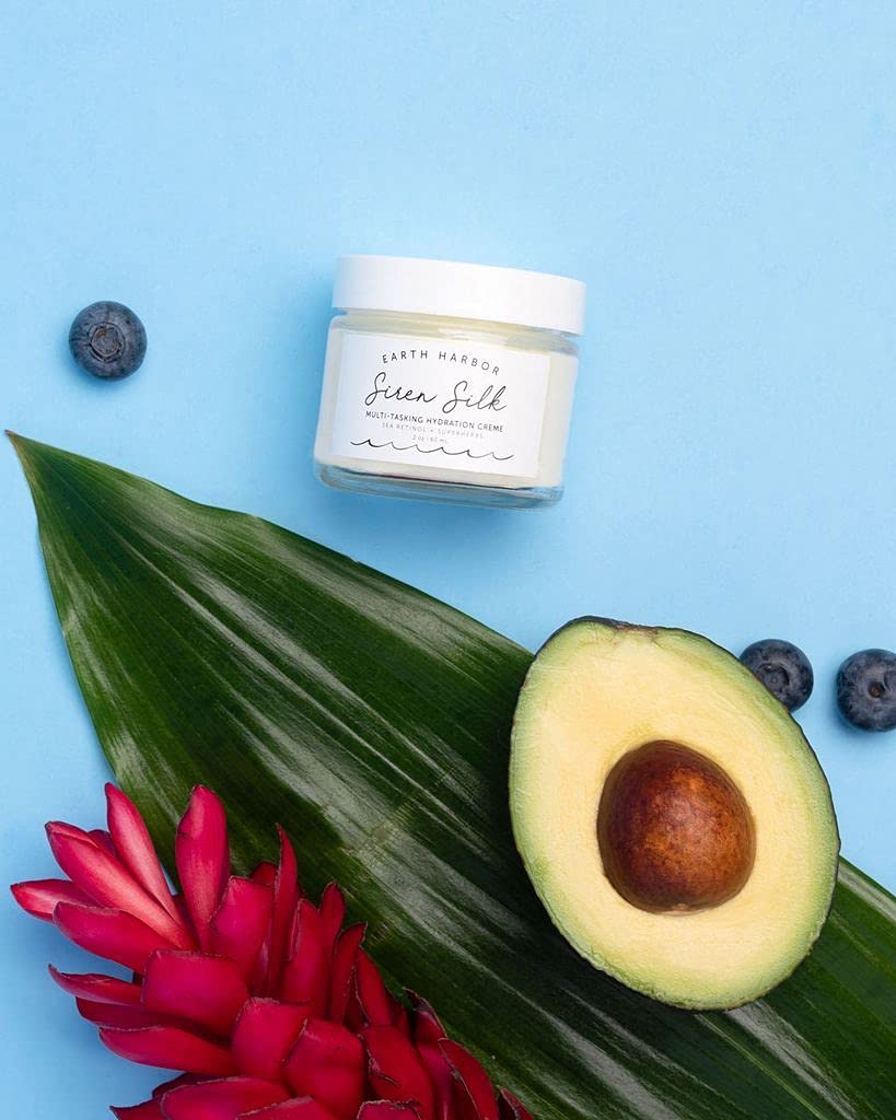 Earth Harbor jar on nightstand implying evening skincare routine benefits
