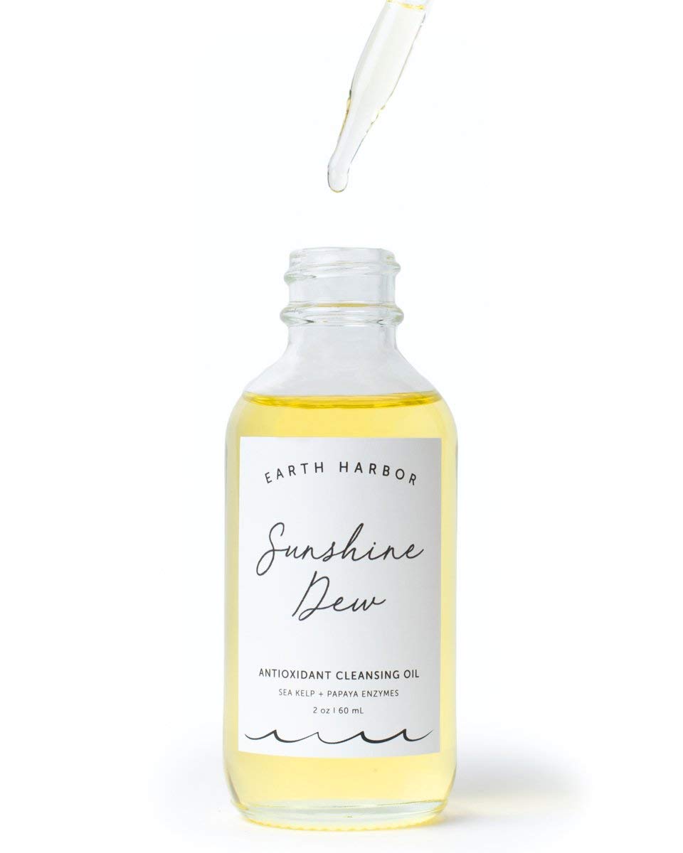 Earth Harbor texture close-up drops illustrating lightweight oil that dissolves makeup