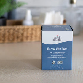 Earth Mama sachet next to ruler showing compact travel size