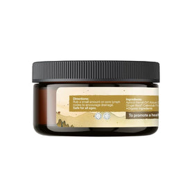 Earthley Wellness lymphatic cream ingredients flatlay with herbs showing botanical support