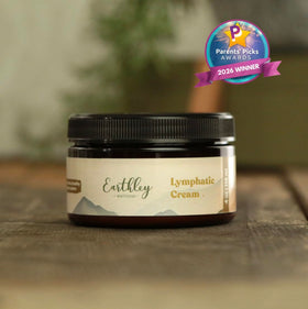 Earthley Wellness lymphatic cream beside a ruler for size comparison and travel-friendly benefit