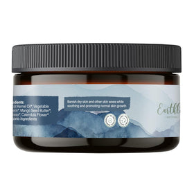 Earthley Wellness balm on fingertip spreading over skin for fast moisturizing