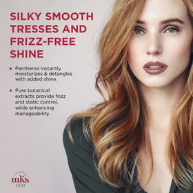 Earthly Body misting onto damp hair for easier detangling and styling