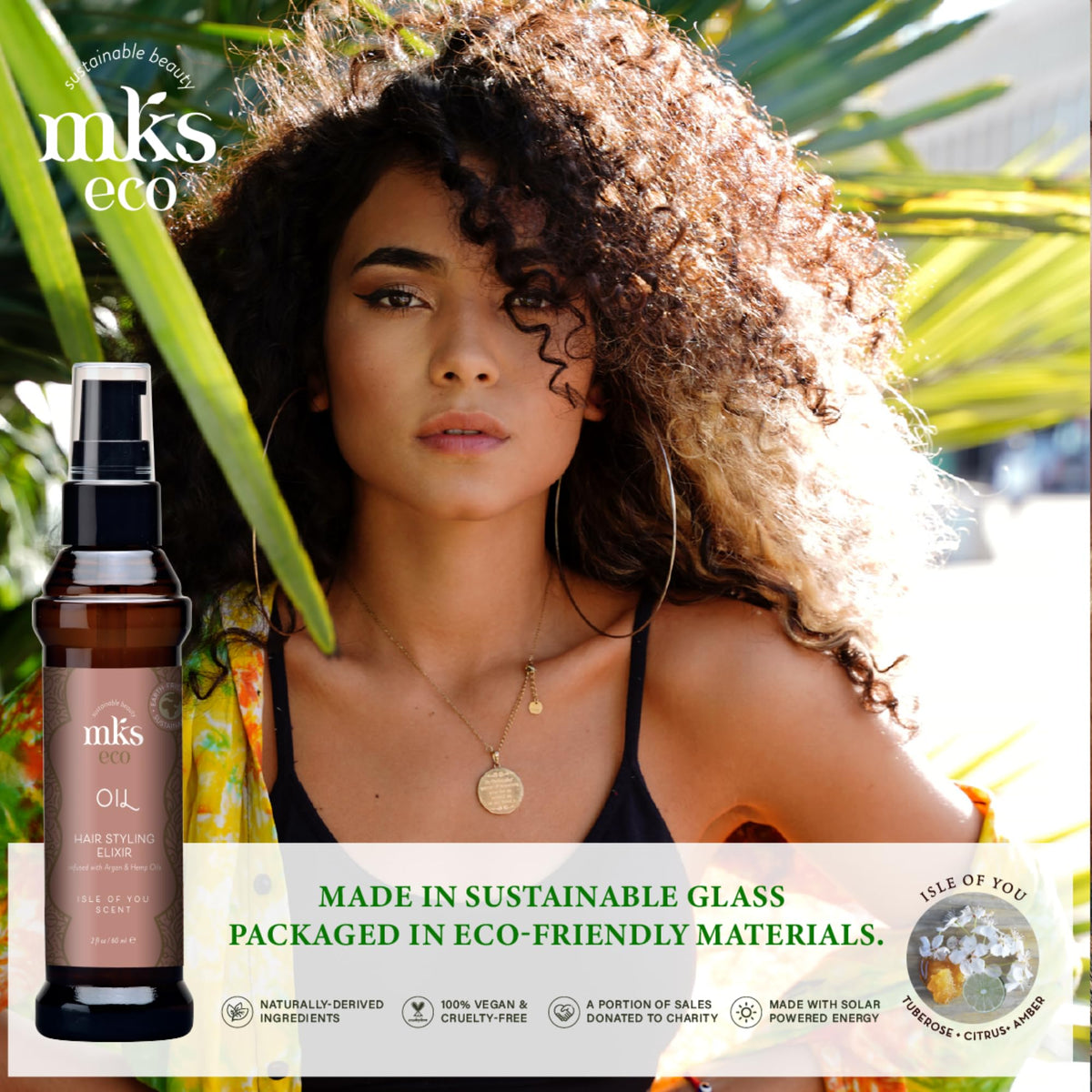 Earthly Body MKS eco Oil on towel-damp hair to lock in moisture and aid heat styling preparation