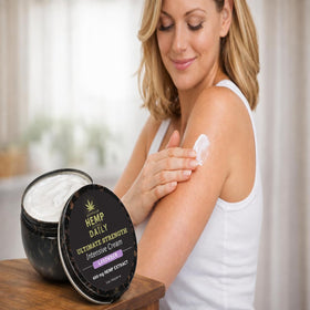 Earthly Body open jar with visible label and easy-scoop packaging benefit