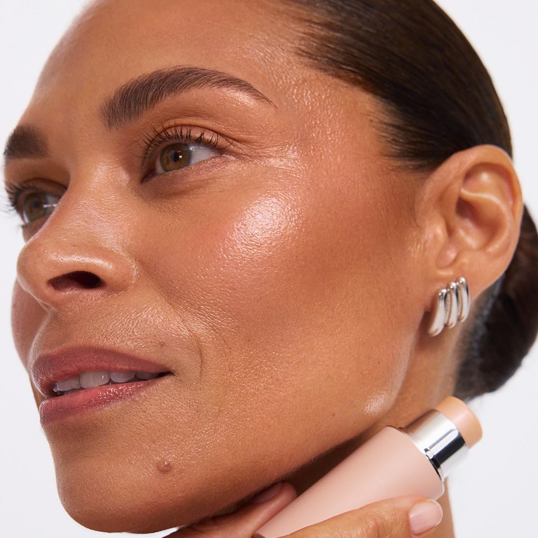 EarthsCure product on vanity at brunch, suggests effortless on-the-go glow and confidence