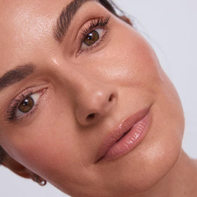 EarthsCure highlighter stick sheen on skin adding subtle radiant glow
