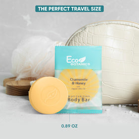 Eco Botanics soap held in hand for size comparison showing travel convenience benefit
