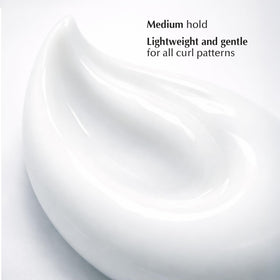 Ecru New York applied to damp hair while scrunching to define curls and reduce frizz