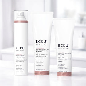 Ecru New York on a bathroom vanity with styling tools suggesting everyday routine benefit