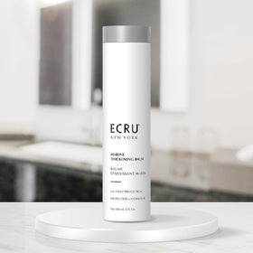 Ecru New York lifestyle shot with glossy, voluminous hair for styling inspiration