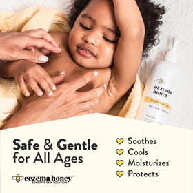 ECZEMA HONEY 16 oz bottle next to a hand for size comparison and portability