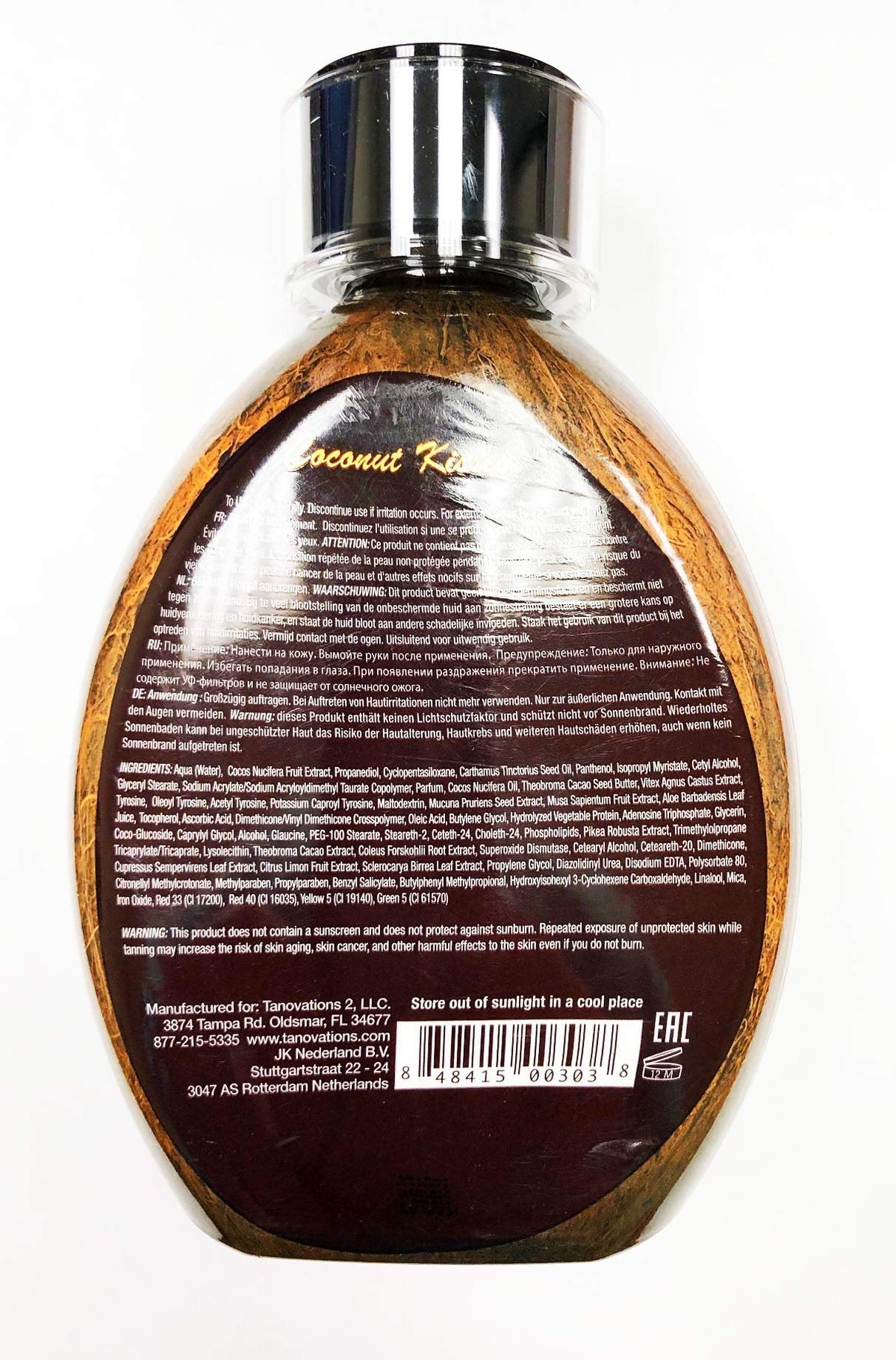 ED HARDY Coconut Kisses lotion texture close-up showing rich coconut creaminess for soft skin