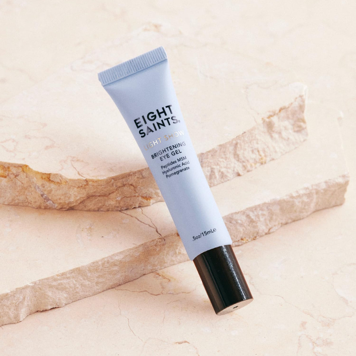 Eight Saints cooling metal applicator close-up, offers instant soothing