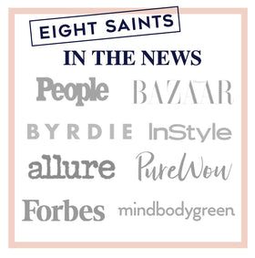 Eight Saints bottle next to common items for scale showing portable 8-ounce size