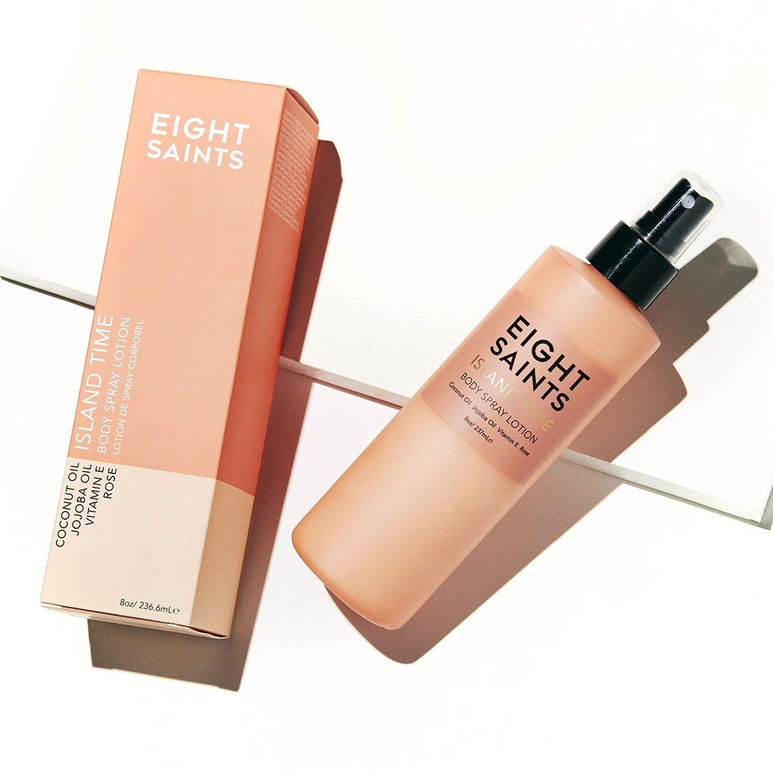 Eight Saints lotion spraying from bottle into hand demonstrating easy, even application