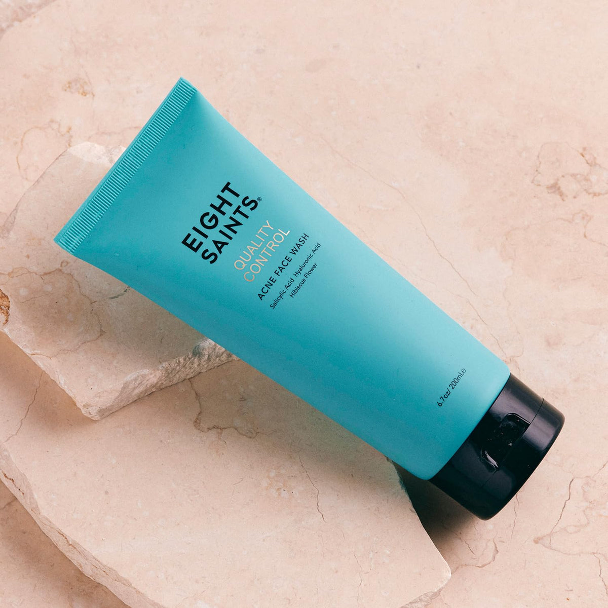 Eight Saints label close-up highlighting 2% salicylic acid and ingredient callouts for clarity