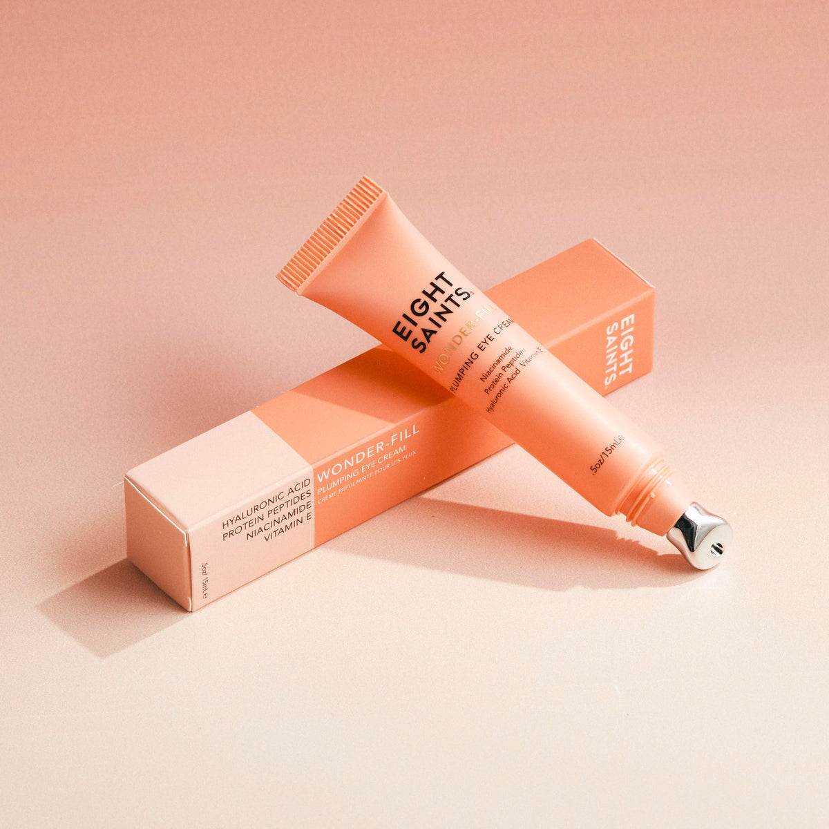 Eight Saints product beside ingredient jar emphasizing hyaluronic and peptides