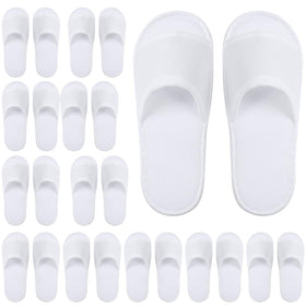 Elcoho front pack of white disposable spa slippers showing neat presentation and convenience