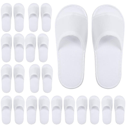 Elcoho front pack of white disposable spa slippers showing neat presentation and convenience