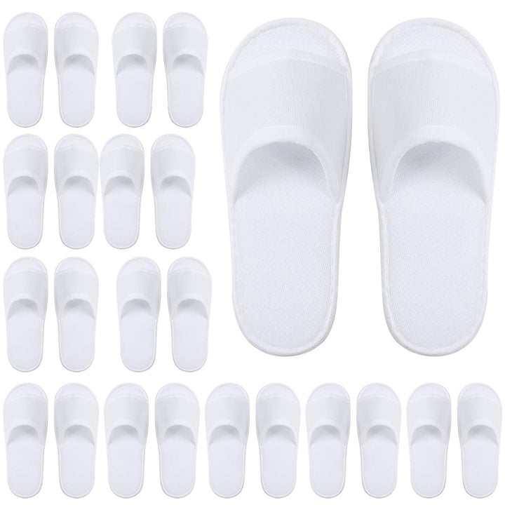 Elcoho front pack of white disposable spa slippers showing neat presentation and convenience