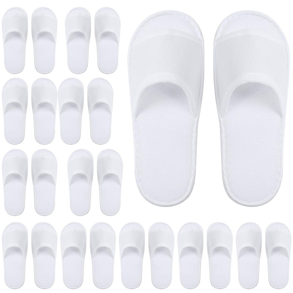 Elcoho front pack of white disposable spa slippers showing neat presentation and convenience
