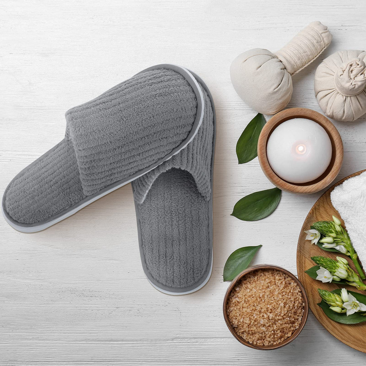 Elcoho slippers packed in a suitcase showing portability benefit