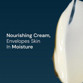 ELEMIS applying cream to hand for conditioned nails and soft skin