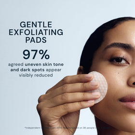 ELEMIS pad held in hand to show size and travel‑friendly scale for on‑the‑go use