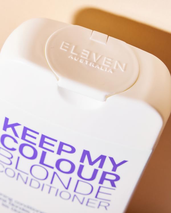 ELEVEN AUSTRALIA conditioner being applied to towel-dried hair for toning benefit
