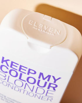 ELEVEN AUSTRALIA conditioner being applied to towel-dried hair for toning benefit