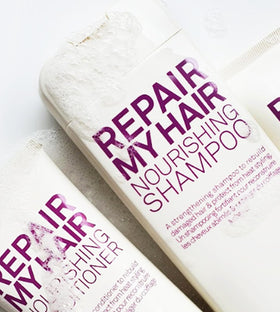 ELEVEN AUSTRALIA shampoo being applied to wet hair for hydration