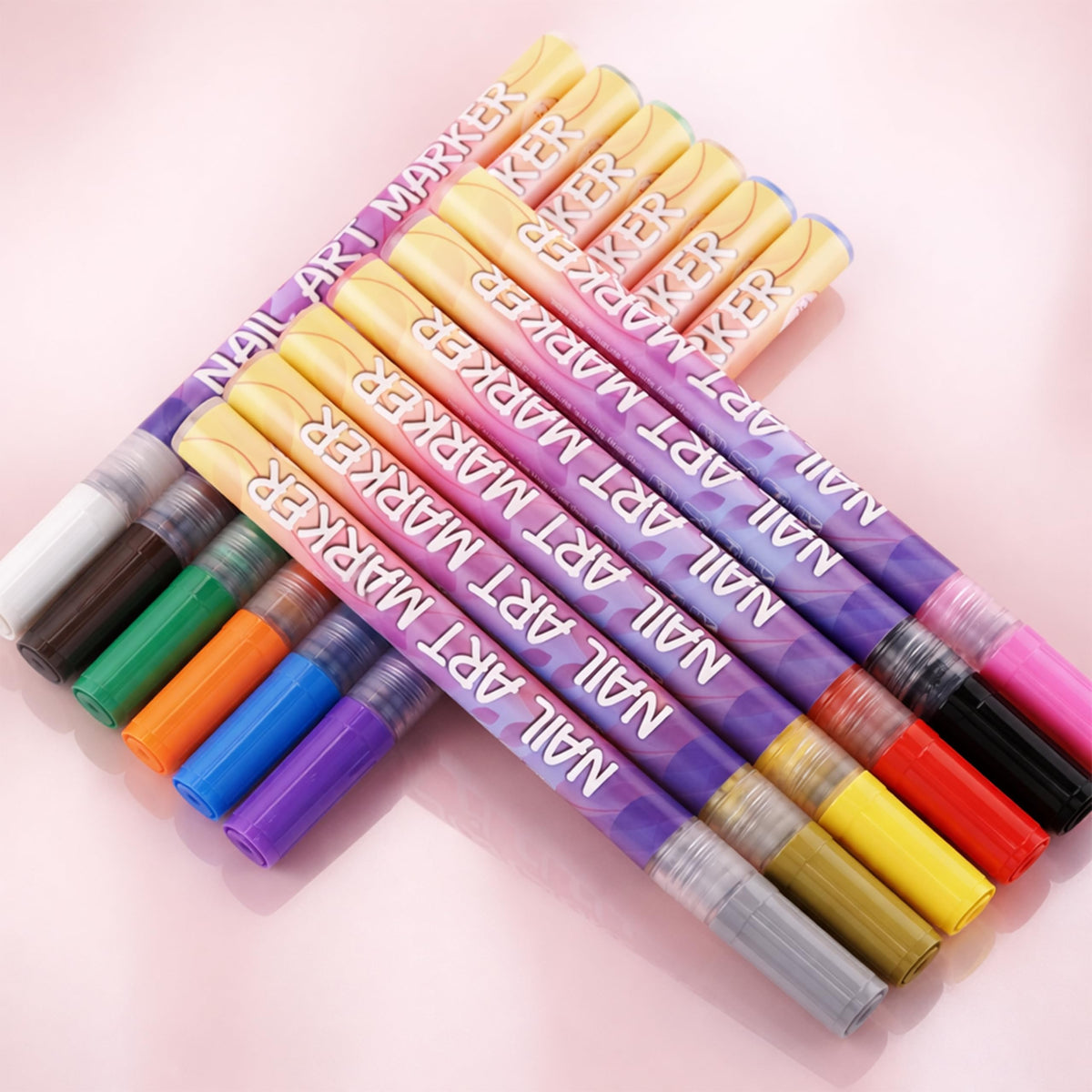 ELIFERA pens next to nail brushes demonstrating compatibility for layered techniques