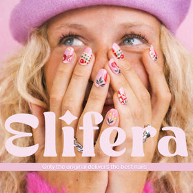 ELIFERA pen in use drawing a detailed floral accent for easy at-home mani