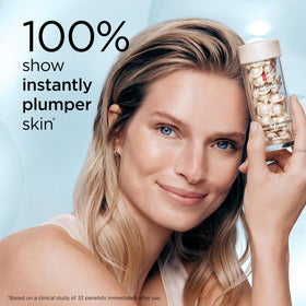Elizabeth Arden capsule opened with serum visible, showing fresh sealed formula and potency preservation