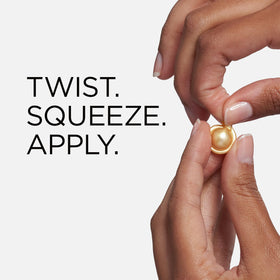 Elizabeth Arden capsule being twisted off to reveal single-dose serum