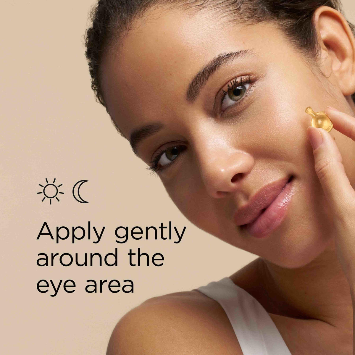 Elizabeth Arden applying serum around eye demonstrating gentle patting for hydration